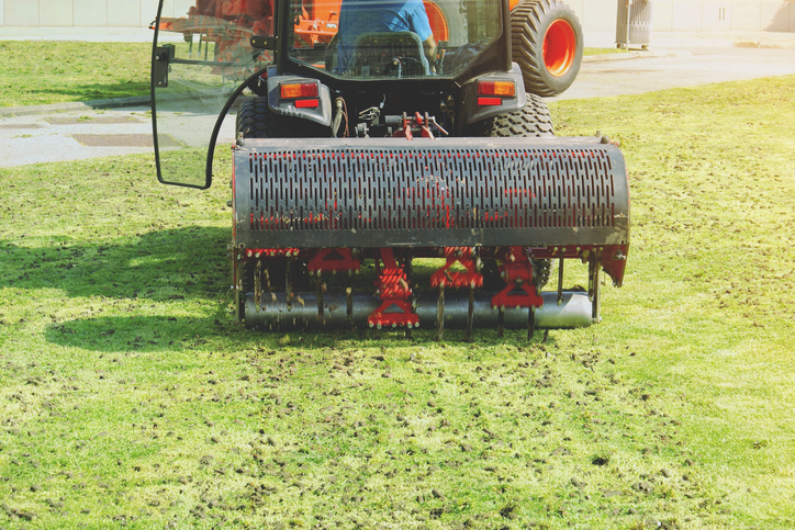 core aeration being performed